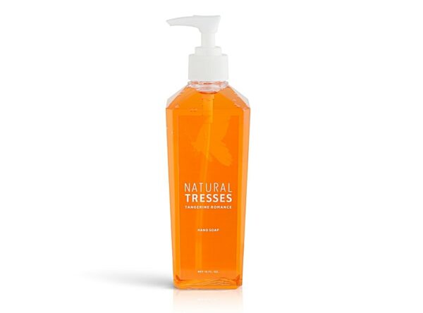 Custom clear label sample showing shampoo print artwork applied on clear pump bottle