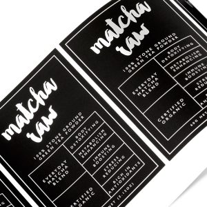 Matcha Raw custom tea labels in sheets showing silver foil stamp
