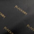 17gsm black custom printed tissue paper with Blackbox Mafia logo print in gold ink