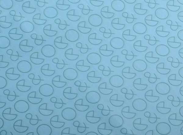 17gsm turquoise stock custom printed tissue paper Custom turquoise tissue paper printed with geometric logo and ampersand pattern in dark turquoise ink