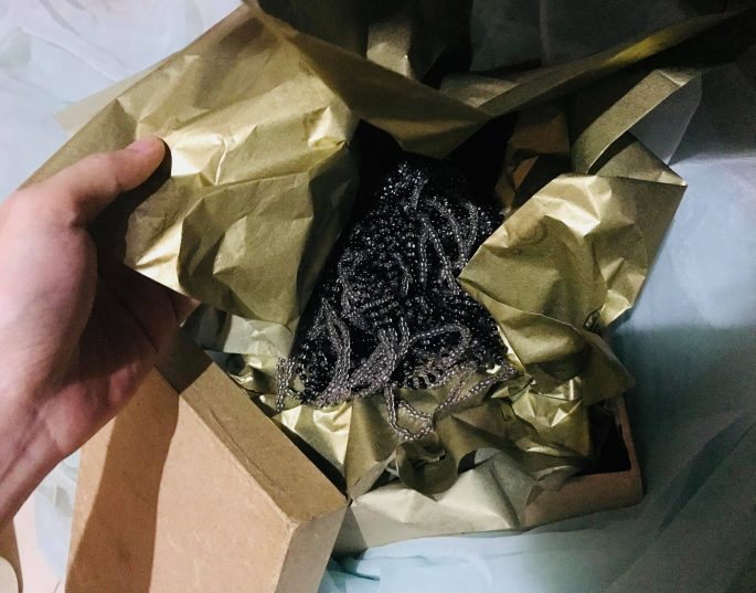 Unboxing Products Wrapped in Gold Custom Tissue Paper