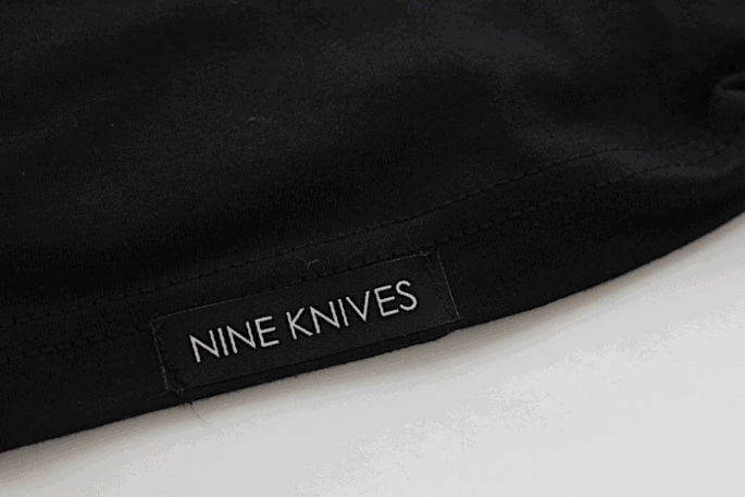 Nine Knives - Tshirt Front Label - Inkable Label Co. Spotlight